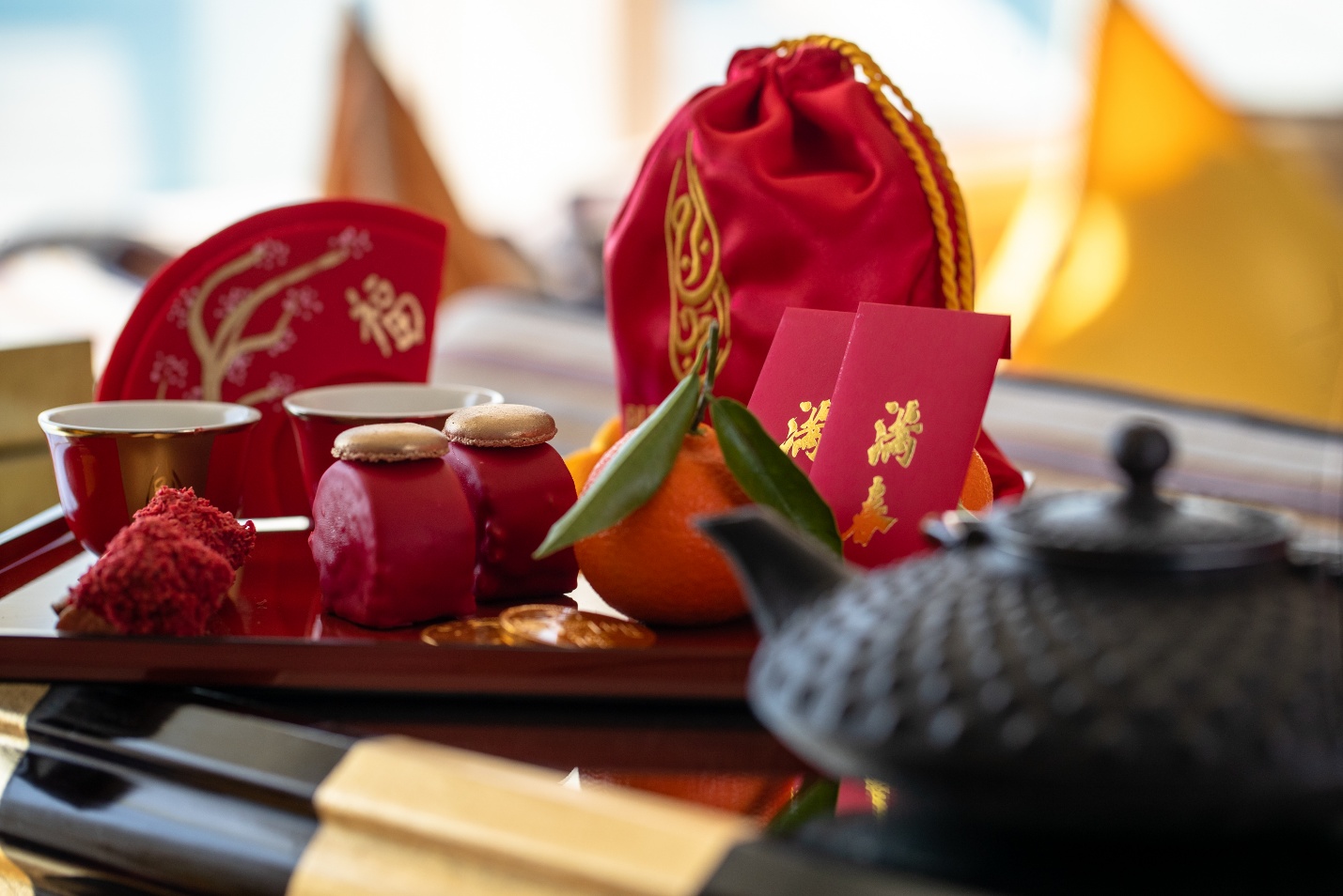 A tray with food and a bag of tea

Description automatically generated